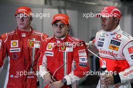 27.09.2008 Singapore City, Singapore,  3rd, Kimi Raikkonen (FIN), Räikkönen, Scuderia Ferrari, 1st, Felipe Massa (BRA), Scuderia Ferrari and 2nd, Lewis Hamilton (GBR), McLaren Mercedes - Formula 1 World Championship, Rd 15, Singapore Grand Prix, Saturday Qualifying