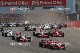 11.05.2008 Istanbul, Turkey,  Start, Felipe Massa (BRA), Scuderia Ferrari, F2008 leads Lewis Hamilton (GBR), McLaren Mercedes, MP4-23 - Formula 1 World Championship, Rd 5, Turkish Grand Prix, Sunday Race