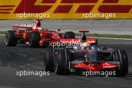 11.05.2008 Istanbul, Turkey,  Lewis Hamilton (GBR), McLaren Mercedes, MP4-23 and Kimi Raikkonen (FIN), Räikkönen, Scuderia Ferrari, F2008 - Formula 1 World Championship, Rd 5, Turkish Grand Prix, Sunday Race