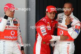 10.05.2008 Istanbul, Turkey,  Heikki Kovalainen (FIN), McLaren Mercedes with pole sitter Felipe Massa (BRA), Scuderia Ferrari and Lewis Hamilton (GBR), McLaren Mercedes - Formula 1 World Championship, Rd 5, Turkish Grand Prix, Saturday Qualifying