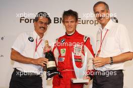 14.09.2008 Monza, Italy,  Formula BMW Europe Prize Giving - l-r, Mario Theissen (GER), BMW Sauber F1 Team, BMW Motorsport Director, 2nd, Marco Wittmann (GER), Josef-Kaufmann-Racing and Klaus Draeger (GER), BMW AG Member of the Board - Formula BMW Europe 2008, Rd 15 & 16, Monza, Sunday Podium