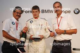 14.09.2008 Monza, Italy,  Formula BMW Europe Prize Giving - l-r, Mario Theissen (GER), BMW Sauber F1 Team, BMW Motorsport Director, Michael Christensen (DEN), Double R Racing, Rookie Champion and Klaus Draeger (GER), BMW AG Member of the Board - Formula BMW Europe 2008, Rd 15 & 16, Monza, Sunday Podium