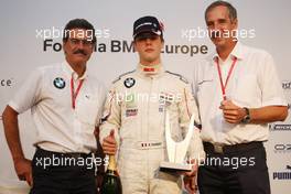 14.09.2008 Monza, Italy,  Formula BMW Europe Prize Giving - l-r, Mario Theissen (GER), BMW Sauber F1 Team, BMW Motorsport Director, 3rd, Adrien Tambay (FRA), Eifelland Racing and Klaus Draeger (GER), BMW AG Member of the Board - Formula BMW Europe 2008, Rd 15 & 16, Monza, Sunday Podium