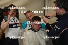 06.12.2008 Mexico City, Mexico,  Last years winner Philipp Eng (AT) on his Formula One drive with the BMW Sauber F1 Team gets a Rookie hair cut from the F1 Team, Formula BMW World Final 2008 at the Autodromo Hermanos Rodríguez, 4th-7th of December 2008