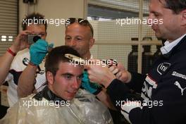 06.12.2008 Mexico City, Mexico,  Last years winner Philipp Eng (AT) on his Formula One drive with the BMW Sauber F1 Team gets a Rookie hair cut from the F1 Team, Formula BMW World Final 2008 at the Autodromo Hermanos Rodríguez, 4th-7th of December 2008