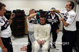 06.12.2008 Mexico City, Mexico,  Last years winner Philipp Eng (AT) on his Formula One drive with the BMW Sauber F1 Team gets a Rookie hair cut from the F1 Team, Formula BMW World Final 2008 at the Autodromo Hermanos Rodríguez, 4th-7th of December 2008