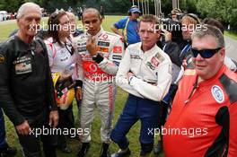 13.07.2008 Goodwood, England,  Lewis Hamilton (GBR), McLaren Mercedes with some motorbike riders - Goodwood Festival of Speed 2008