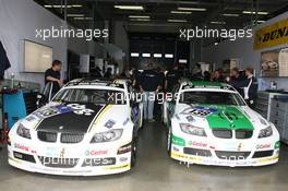 21.05.2009 Nurburgring, Germany,  Waiting in the garage: Motorsport Arena Oschersleben, BMW E90 320d, Peter Posavac (GER), Lars Stugemo (SWE), Marko Hartung (GER), Paul Spooner (BRN) and Motorsport Arena Oschersleben, BMW E90 320d, Emin Akata (GER), Juergen Dinstuehler (GER), Andreas Winkler (GER), Torsten Schubert (GER)  - Nurburgring 24 Hours 2009