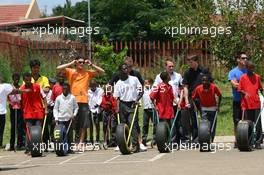 19.02.2009 Johannesburg, South Africa,  A1GP Drivers at a Soweto School  - A1GP World Cup of Motorsport 2008/09, Round 5, Gauteng, Thursday - Copyright A1GP - Free for editorial usage