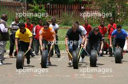 19.02.2009 Johannesburg, South Africa,  A1GP Drivers at a Soweto School  - A1GP World Cup of Motorsport 2008/09, Round 5, Gauteng, Thursday - Copyright A1GP - Free for editorial usage