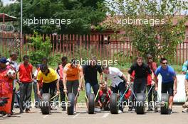 19.02.2009 Johannesburg, South Africa,  A1GP Drivers at a Soweto School - A1GP World Cup of Motorsport 2008/09, Round 5, Gauteng, Thursday - Copyright A1GP - Free for editorial usage