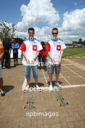 19.02.2009 Johannesburg, South Africa,  Neel Jani (SUI), driver of A1 Team Switzerland and Alexandre Imperatori (SUI), driver of A1 Team Switzerland visit a Soweto school  - A1GP World Cup of Motorsport 2008/09, Round 5, Gauteng, Thursday - Copyright A1GP - Free for editorial usage