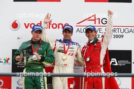 12.04.2009 Portimao, Portugal,  2nd place Adam Carroll (IRL), driver of A1 Team Ireland with 1st place Neel Jani (SUI), driver of A1 Team Switzerland and 3rd place Filipe Albuquerque (POR), driver of A1 Team Portugal - A1GP World Cup of Motorsport 2008/09, Round 6, Algarve, Sunday Race 2 - Copyright A1GP - Free for editorial usage