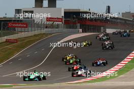 12.04.2009 Portimao, Portugal,  Adam Carroll (IRL), driver of A1 Team Ireland lead the start of the race - A1GP World Cup of Motorsport 2008/09, Round 6, Algarve, Sunday Race 2 - Copyright A1GP - Free for editorial usage