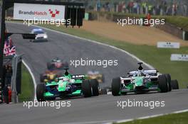 03.05.2009 Fawkham, England,  Adam Carroll (IRL), driver of A1 Team Ireland and Salvador Duran (MEX), driver of A1 Team Mexico side by sided at the start of the race - A1GP World Cup of Motorsport 2008/09, Round 7, Brands Hatch, Sunday Race 2 - Copyright A1GP - Free for editorial usage