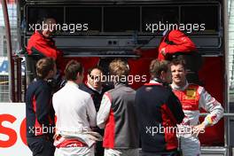 16.05.2009 Hockenheim, Germany,  During code red a bunch of Audi drivers reported to the pitstand. - DTM 2009 at Hockenheimring, Germany
