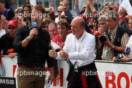 17.05.2009 Hockenheim, Germany,  (right) Dr. Wolfgang Ullrich (GER), Audi's Head of Sport gives 2 thumbs up to Oliver Jarvis as he enters the parc fermé. - DTM 2009 at Hockenheimring, Germany