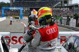 17.05.2009 Hockenheim, Germany,  Oliver Jarvis (GBR), Audi Sport Team Phoenix (3rd), congratulates Tom Kristensen (DNK), Audi Sport Team Abt (1st) - DTM 2009 at Hockenheimring, Germany