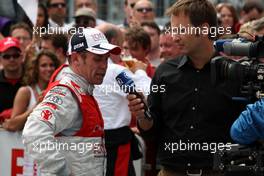 17.05.2009 Hockenheim, Germany,  (left) Tom Kristensen (DNK), Audi Sport Team Abt, Audi A4 DTM being interviewed by German ARD television. - DTM 2009 at Hockenheimring, Germany