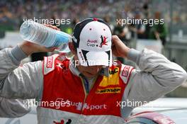 17.05.2009 Hockenheim, Germany,  Oliver Jarvis (GBR), Audi Sport Team Phoenix, Portrait (3rd) cooling himself down with some water - DTM 2009 at Hockenheimring, Germany