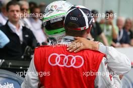 17.05.2009 Hockenheim, Germany,  Timo Scheider (GER), Audi Sport Team Abt, Audi A4 DTM (3rd), congratulates Tom Kristensen (DNK), Audi Sport Team Abt, Audi A4 DTM with his victory - DTM 2009 at Hockenheimring, Germany