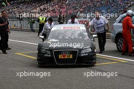 17.05.2009 Hockenheim, Germany,  Car of Timo Scheider (GER), Audi Sport Team Abt, Audi A4 DTM being pushed into the parc fermé by marshallers. - DTM 2009 at Hockenheimring, Germany