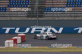 30.05.2009 Klettwitz, Germany,  Maro Engel (GER), Muecke Motorsport AMG Mercedes C-Klasse off-road on the oval turn 1 - DTM 2009 at Eurospeedway Lausitz (Lausitzring)