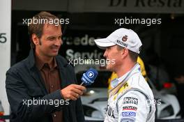 18.07.2009 Zandvoort, The Netherlands,  Ralf Schumacher (GER), Team HWA AMG Mercedes, Portrait, being interviewed for German TV after finishing last in the qualifying - DTM 2009 at Circuit Park Zandvoort, The Netherlands