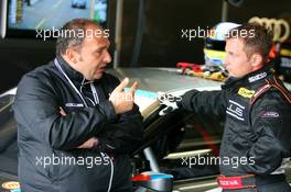 18.07.2009 Zandvoort, The Netherlands,  Colin Kolles (GER), Team Owner Kolles TME, talking with a mechanic - DTM 2009 at Circuit Park Zandvoort, The Netherlands