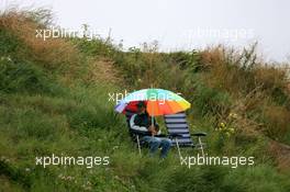 18.07.2009 Zandvoort, The Netherlands,  A lonely fan in the dunes - DTM 2009 at Circuit Park Zandvoort, The Netherlands