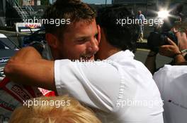 15.08.2009 Nürburg, Germany,  Hans-Jurgen Abt (GER), Teamchef Abt-Audi congratulates Martin Tomczyk (GER), Audi Sport Team Abt, Portrait with his pole position - DTM 2009 at Nürburgring, Germany