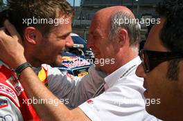 15.08.2009 Nürburg, Germany,  Dr. Wolfgang Ullrich (GER), Audi's Head of Sport (right), congratulates Martin Tomczyk (GER), Audi Sport Team Abt, Portrait (left) with his pole position - DTM 2009 at Nürburgring, Germany