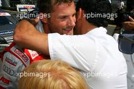 15.08.2009 Nürburg, Germany,  Hans-Jurgen Abt (GER), Teamchef Abt-Audi, congratulates Martin Tomczyk (GER), Audi Sport Team Abt, Portrait, with his pole position - DTM 2009 at Nürburgring, Germany