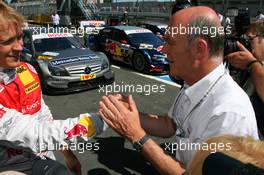 15.08.2009 Nürburg, Germany,  Dr. Wolfgang Ullrich (GER), Audi's Head of Sport, congratulates Mattias Ekström (SWE), Audi Sport Team Abt, Portrait, with his 3rd place - DTM 2009 at Nürburgring, Germany