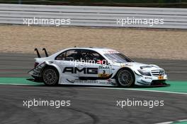 16.08.2009 Nürburg, Germany,  Paul di Resta (GBR), Team HWA AMG Mercedes, AMG Mercedes C-Klasse lost his rear wing and spun off in the first corner into the gravel and had to withdraw. - DTM 2009 at Nürburgring, Germany