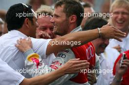 16.08.2009 Nürburg, Germany,  Race winner Martin Tomczyk (GER), Audi Sport Team Abt, Portrait, being congratulates by Hans-Jurgen Abt (GER), Teamchef Abt-Audi - DTM 2009 at Nürburgring, Germany