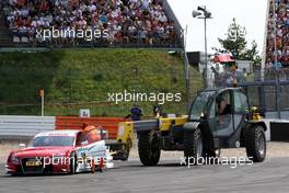 16.08.2009 Nürburg, Germany,  The damaged car of Oliver Jarvis (GBR), Audi Sport Team Phoenix, Audi A4 DTM being towed away. - DTM 2009 at Nürburgring, Germany