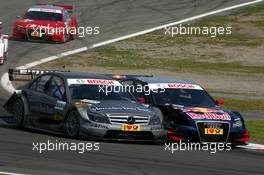 16.08.2009 Nürburg, Germany,  Bruno Spengler (CAN), Team HWA AMG Mercedes, AMG Mercedes C-Klasse and Mattias Ekström (SWE), Audi Sport Team Abt, Audi A4 DTM, side-by-side - DTM 2009 at Nürburgring, Germany