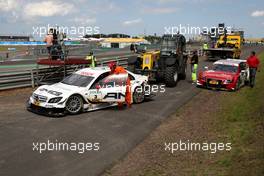 16.08.2009 Nürburg, Germany,  The damaged cars of (left) Paul di Resta (GBR), Team HWA AMG Mercedes, AMG Mercedes C-Klasse and (right) Oliver Jarvis (GBR), Audi Sport Team Phoenix, Audi A4 DTM - DTM 2009 at Nürburgring, Germany
