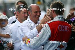 16.08.2009 Nürburg, Germany,  Dr. Wolfgang Ullrich (GER), Audi's Head of Sport, congratulates Martin Tomczyk (GER), Audi Sport Team Abt, with his victory - DTM 2009 at Nürburgring, Germany