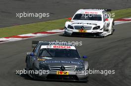 16.08.2009 Nürburg, Germany,  Bruno Spengler (CAN), Team HWA AMG Mercedes, AMG Mercedes C-Klasse, leads Paul di Resta (GBR), Team HWA AMG Mercedes, AMG Mercedes C-Klasse - DTM 2009 at Nürburgring, Germany