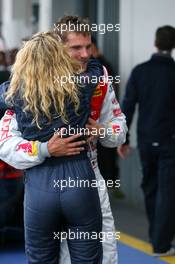 16.08.2009 Nürburg, Germany,  Race winner Martin Tomczyk (GER), Audi Sport Team Abt, being congratulated by his girlfriend Christina Surer (SUI) - DTM 2009 at Nürburgring, Germany