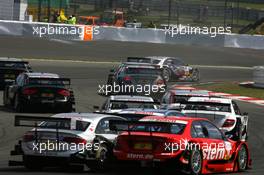 16.08.2009 Nürburg, Germany,  Cars fighting their way through the first corners on the first lap of the race - DTM 2009 at Nürburgring, Germany