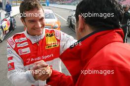 24.10.2009 Hockenheim, Germany,  Hans-Jurgen Abt (GER), Teamchef Abt-Audi congratulates Timo Scheider (GER), Audi Sport Team Abt, Portrait with his 3rd place - DTM 2009 at Hockenheimring, Hockenheim, Germany