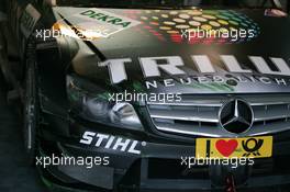 24.10.2009 Hockenheim, Germany,  Paint marks of the tyre barriers on the car of Ralf Schumacher (GER), Team HWA AMG Mercedes, AMG Mercedes C-Klasse after an off track excursion - DTM 2009 at Hockenheimring, Hockenheim, Germany
