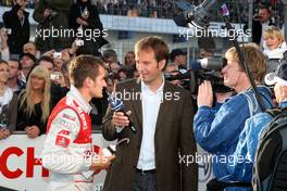 25.10.2009 Hockenheim, Germany,  Timo Scheider (GER), Audi Sport Team Abt, Audi A4 DTM being interviewed on television. - DTM 2009 at Hockenheimring, Hockenheim, Germany