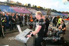 25.10.2009 Hockenheim, Germany,  A band playing in front of the Abt Audi pitbox to celebrate the 2009 DTM championship - DTM 2009 at Hockenheimring, Hockenheim, Germany