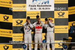 25.10.2009 Hockenheim, Germany,  Championship Podium: Gary Paffett (GBR), Team HWA AG, AMG Mercedes C-Klasse, Timo Scheider (GER), Audi Sport Team Abt Sportsline, Audi A4 DTM, Paul di Resta (GBR), Team HWA AMG Mercedes, AMG Mercedes C-Klasse - DTM 2009 at Hockenheimring, Hockenheim, Germany