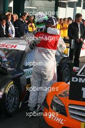 25.10.2009 Hockenheim, Germany,  Tom Kristensen (DNK), Audi Sport Team Abt, congratulates Timo Scheider (GER), Audi Sport Team Abt, with his 2nd DTM championship - DTM 2009 at Hockenheimring, Hockenheim, Germany