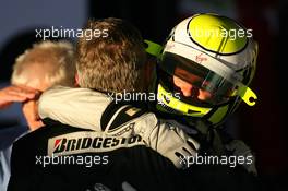 29.03.2009 Melbourne, Australia,  Ross Brawn (GBR) Brawn Grand Prix Team Principal and Jenson Button (GBR), Brawn GP - Formula 1 World Championship, Rd 1, Australian Grand Prix, Sunday Podium